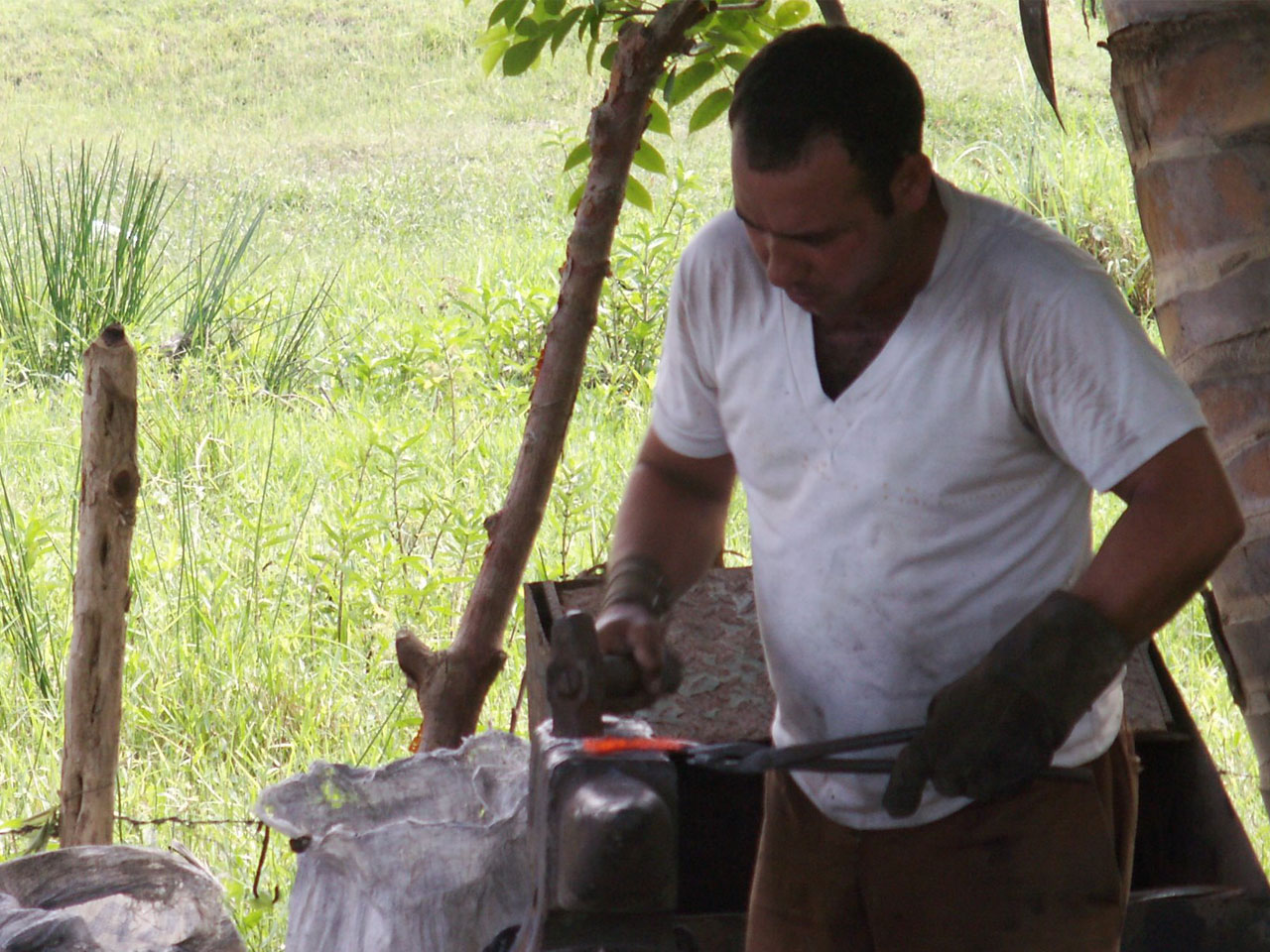 Forger working in the open, Pinar del Rio Province, Cuba